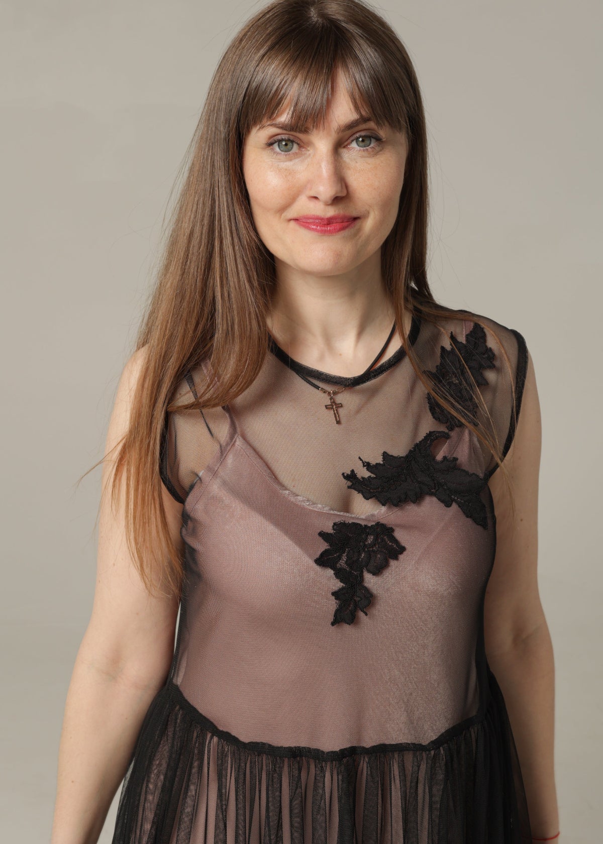 Black Dress Decorated with Lace Applications
