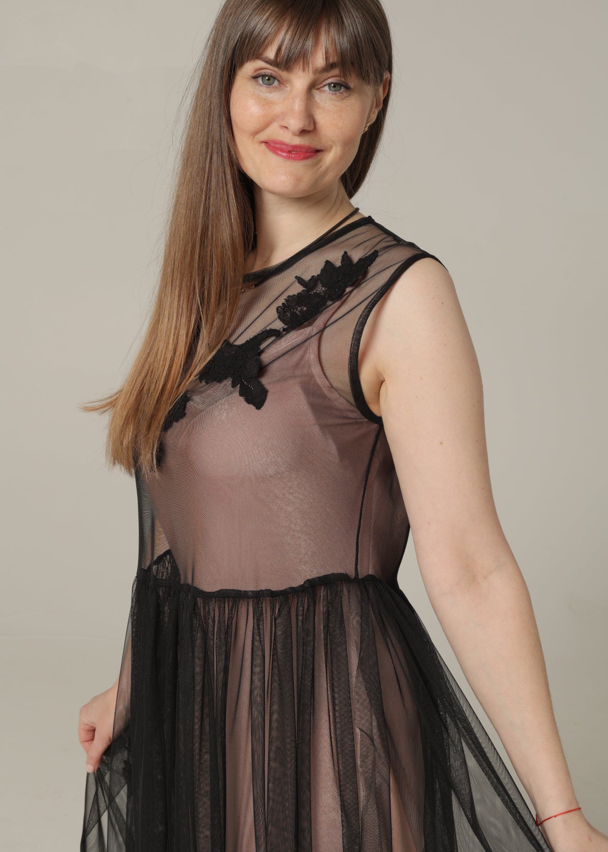 Black Dress Decorated with Lace Applications