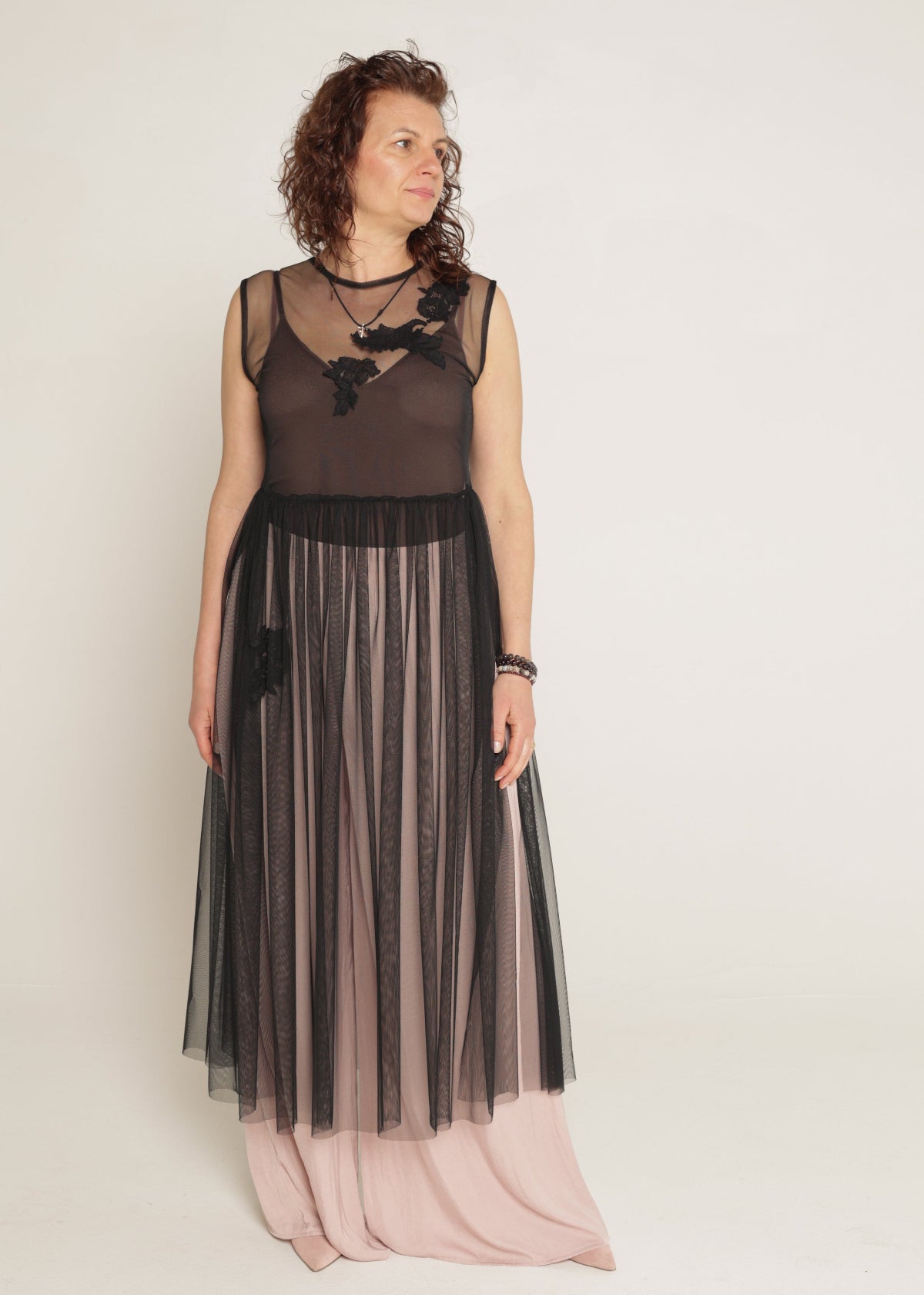 Black Dress Decorated with Lace Applications