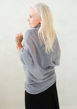 Asymmetric mohair sweater with a turtle neck