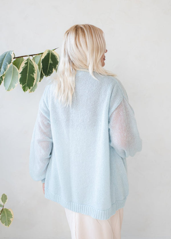 Light blue classic style mohair jacket with flared sleeves