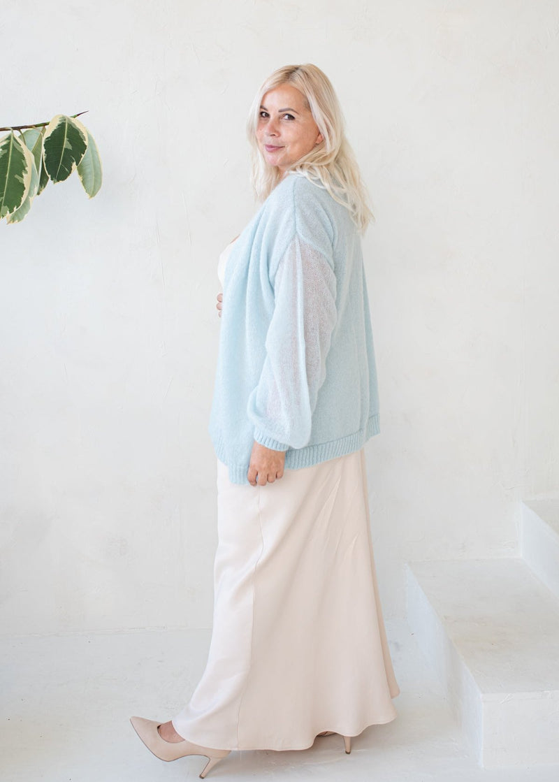 Light blue classic style mohair jacket with flared sleeves