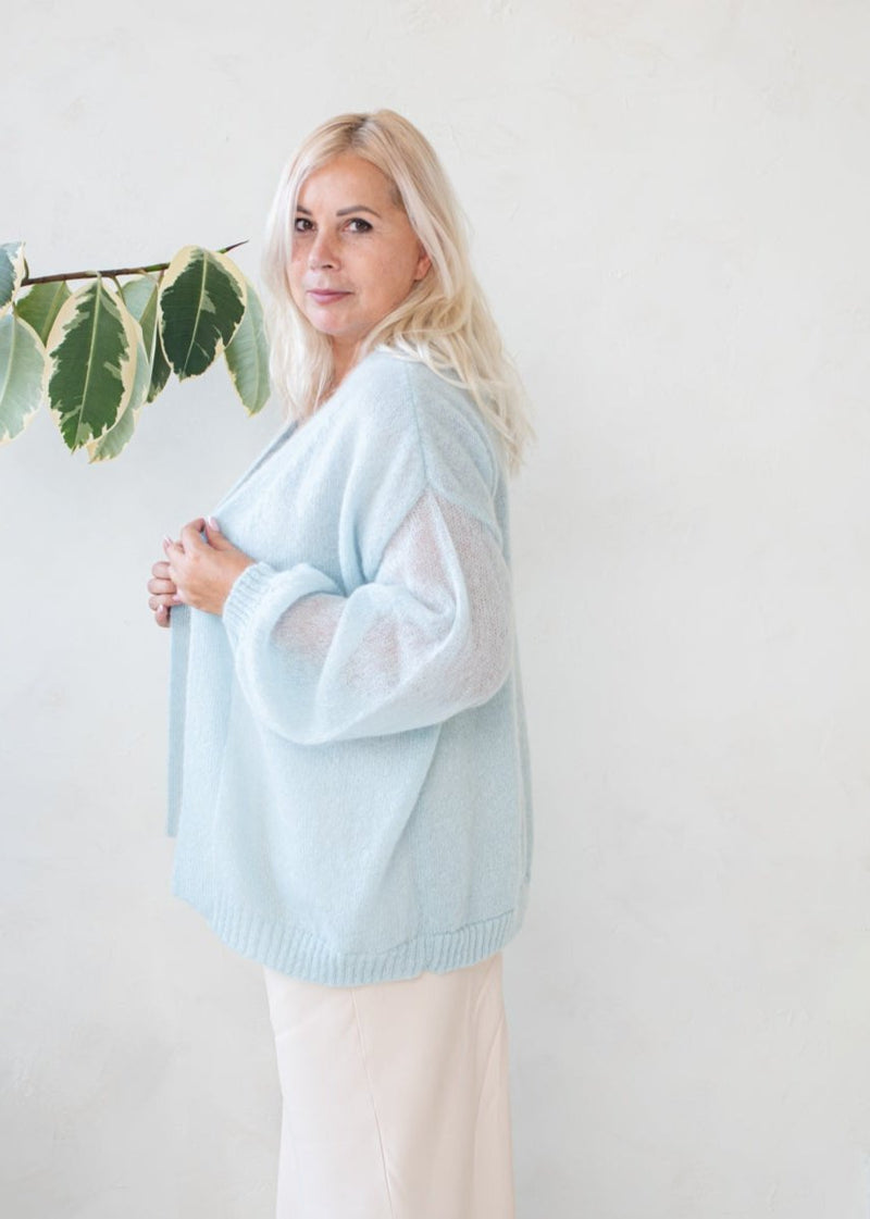 Light blue classic style mohair jacket with flared sleeves