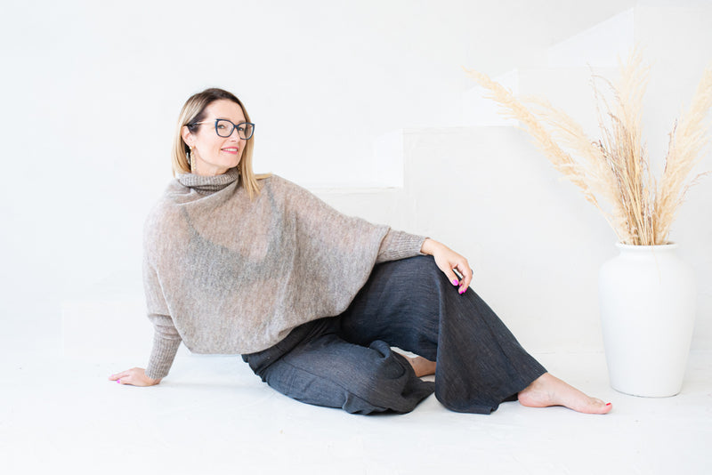 Asymmetric mohair sweater with a turtle neck