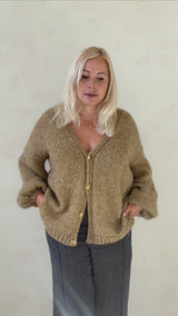 Īsa mohēras jaka ar spīdumu